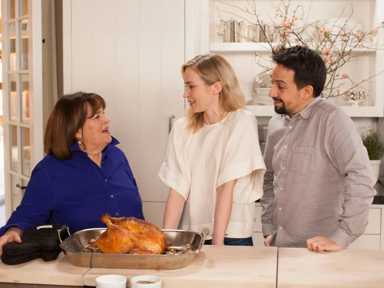 Emily Blunt, Lin-Manuel Miranda, and Ina Garten with her Roasted Capon, as seen on Barefoot Contessa: Back to Basics, Season 15.