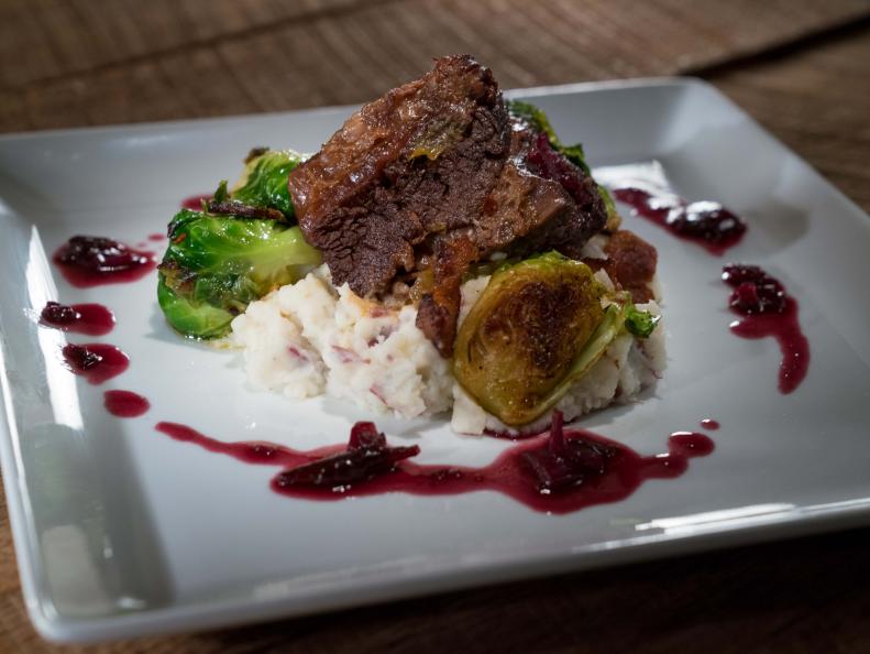 Contestant Manny Washington's dish, Braised Red Wine Short Ribs with Creamy Mash Potatoes with Brussel Sprouts and Bacon, as seen on Food Network Star, Season 14.