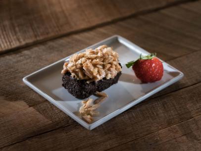 Contestant Debbie Lee's dish, Flourless Double Chocolate Brownie with Maple Almond Puffed Rice Granola, as seen on Comeback Kitchen season 3.