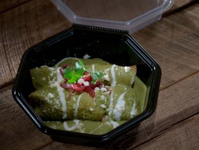 Contestant Sarah Penrod's dish, Shrimp and Crab Enchilada with Roasted Poblano Cream, for the Elevated Delivery Food Challenge, as seen on Comeback Kitchen season 3...