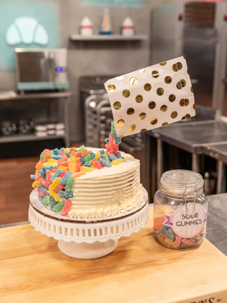 Contestant Matthew Azuma's completed dish from the main bake,  Sourlicious ginger vanilla cake with fresh ginger frosting, as seen on Kids Baking Championship Season 5.