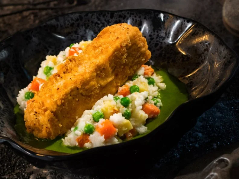Innovative and creative eats from around the galaxy will be available at Star Wars: Galaxy’s Edge when it opens May 31, 2019, at Disneyland Park in Anaheim, Calif., and Aug. 29, 2019, at Disney's Hollywood Studios in Lake Buena Vista, Fla. The Fried Endorian Tip-Yip, found at Docking Bay 7 Food and Cargo inside Star Wars: Galaxy’s Edge, is a decadent chicken dish with roasted vegetable mash and herb gravy. (David Roark/Disney Parks)