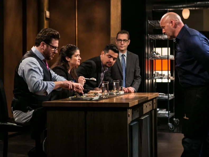 Amateur chef Keith Young steps up to see  how well the judges say he cooked his food as chefs Elda Bielanski and Dinah Suhr stand before host Ted Allen and judges: Scott Conant, Alex Guarnaschelli and Aaron Sanchez to defend their entrees that must have included: Wagyu ribeye steaks, jalapeno chips, pink pearl sedum and mango as they compete for a slot in the Chopped Ultimate Championship competition, the winner of which receives $50,000 and a new car from Buick, as seen on Food Network's Chopped, Season 21.