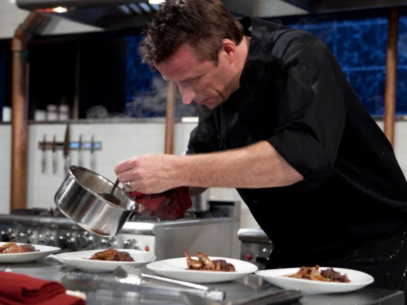 Chopped: After Hours chef Marc Murphy working on his entree that must include: Chocolate cake pops, white chocolate cocoa mix, quail and Serrano peppers, as seen on Food Network's Chopped: After Hours.