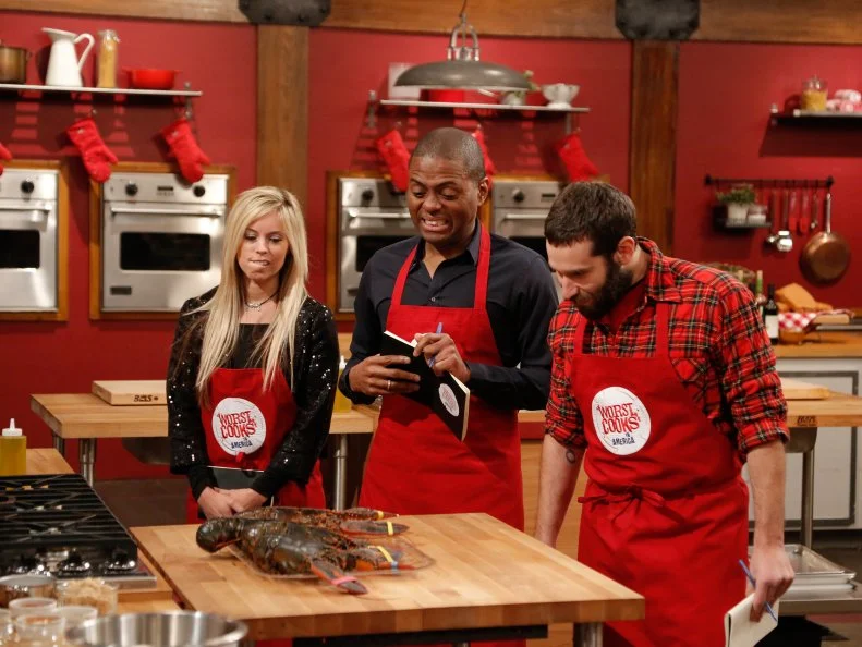 Chef Anne Burrell surprises her recruits with live lobsters which they will have to prepare as part of the Surf and Turf Challenge. For this challenge, each team must replicate surf and turf dishes demonstrated to them by their team leader; Grilled Ribeye with Fra Diavolo Lobster Relish by Chef Bobby Flay for the Blue Team, and Dry Rubbed Rib Eye with Chili Lobster by Chef Anne Burrell for her Red Team. The Red Team recruits are: Carie Pullano-Keller, Jamie Thomas and Mike Glazer, as seen on Food Network's Worst Cooks in America, Season 5.