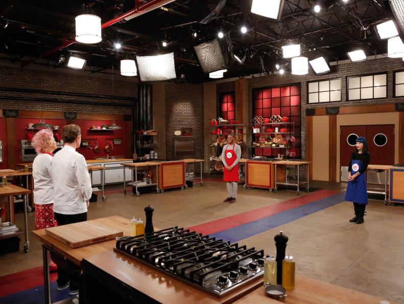 Red Team Leader Chef Anne Burrell and Blue Team Leader Chef Bobby Flay announce a surprise skill drill to kick off the final challenge for the only recruits remaining in the competition; Jamie Thomas from the Red Team and Amber Brauner from the Blue Team, as seen on Food Network's Worst Cooks in America, Season 5.