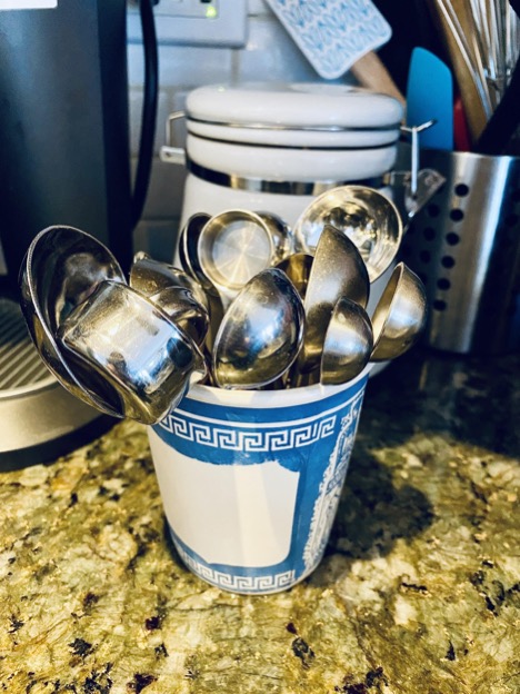 https://food.fnr.sndimg.com/content/dam/images/food/unsized/2020/02/28/fn_measuring-spoons-in-cup.jpg