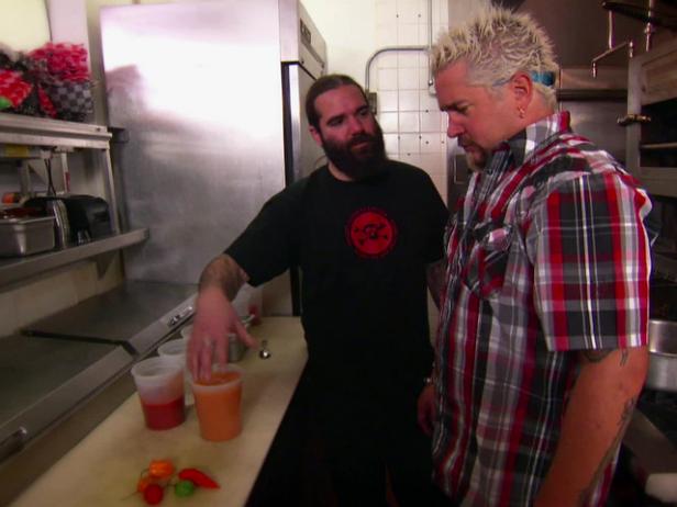 Guy Fieri Tries the Infamous 666 Wings With Death Juice | Food Network