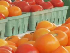Slice the tomatoes in big and small pieces for a more dramatic salad. For best results, make the salad without ever refrigerating the tomatoes, but with the watermelon ice cold from the refrigerator. The contrast of temperatures will give the salad an extra fresh taste. You will need Mozzarella in the "bag" with liquid; the liquid is used in the dressing.