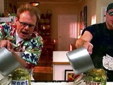 Alton Brown and a guest make and can pickles.