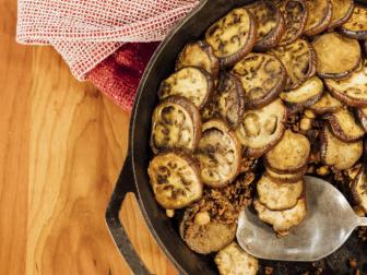 Eggplant with Tabaleh in cast iron, as seen on Served Family Style.