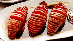 Grilled Hassleback Sweet Potatoes with Molasses-Nutmeg Butter
