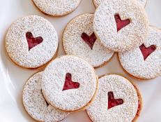 MINI LINZER COOKIES
Ina Garten
Barefoot Contessa/Card Sharks’ Delight
Food Network
Unsalted Butter, Granulated Sugar, Vanilla Extract, Flour, Salt, Raspberry Preserves,
Confectioners’ Sugar