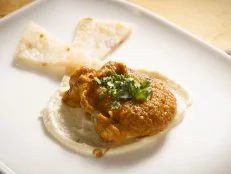 Contestant Palak Patel's chicken curry over cashew sauce with roasted onion and chili bread, as seen on Food Network's Beat Bobby Flay, Season 2