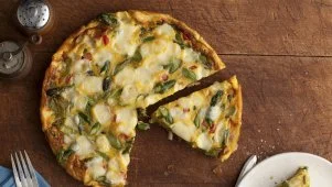 Giada De Laurentiis Makes Her Frittata With Asparagus, Tomatoes and Fontina