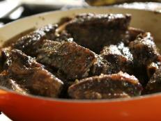 Oven-Baked Spare Ribs with Porter Beer Mop in the pan, as seen on Food Network's Heartland Table, Season 1.