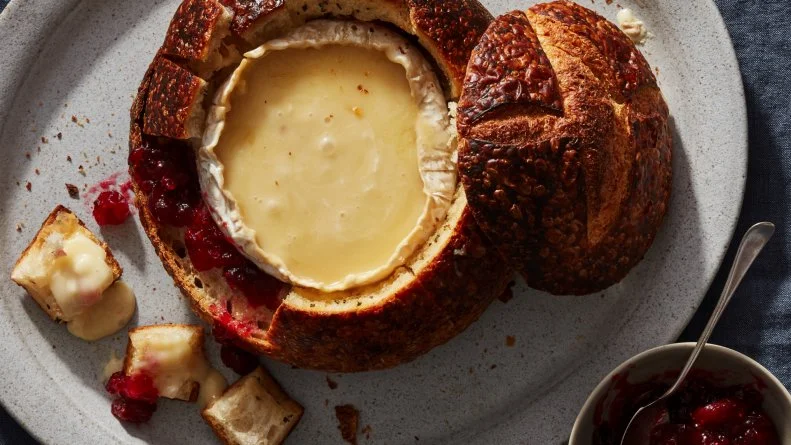 Food Network Kitchen’s Brie-and-Cranberry Stuffed Bread Bowl, as seen on Food Network.