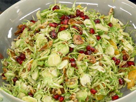 Shaved Brussels Sprouts with Pomegranate Orange Vinaigrette and Pecans