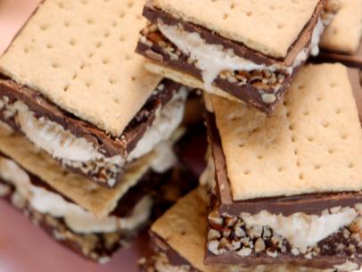 Homemade Ice Cream Sandwiches: I had some Blue Bell in the freezer, so I  just added a scoop between two of my homemade chocolate Graham…