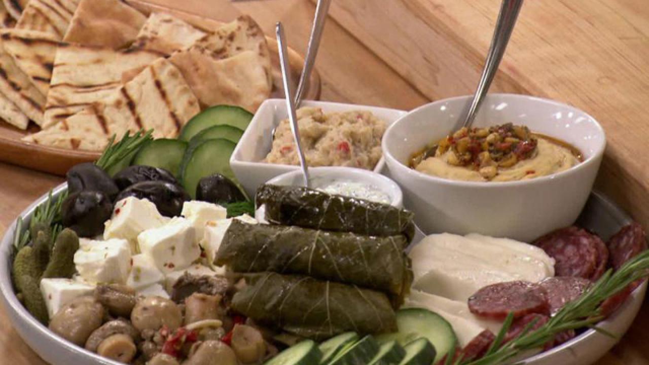 Dolmades (Stuffed Grape Leaves with Currants and Pistachio)