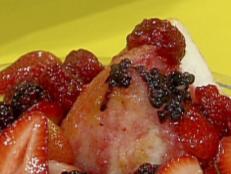 Angelic cake and berries prepared by Rachael Ray.
