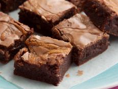 Bobby Flay's peanut butter and caramel swirled brownies cut into squares.