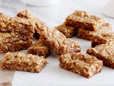 APRICOT OAT BARS
Giada De Laurentiis
Giada at Home/Walk for Life
Food Network
Cooking Spray, Dried Apricots, Allpurpose
Flour, Light Brown Sugar, Ground Cinnamon, Sea
Salt, Baking Soda, Oldfashioned
Oats, Walnuts, Unsalted Butter, Egg, Vanilla Extract