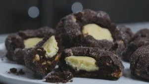 Giant Cheesecake Filled Chocolate Thumbprint Cookie