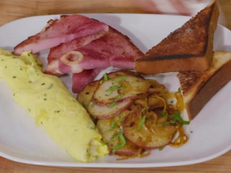 French Omelette, Ham Steak and Lyonnaise Potatoes